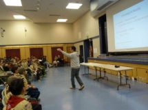 student presenting to boy scout group